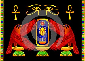 Two horus falcons hold the cartouche with the throne name of Tutankhamun photo