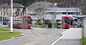 Two red Innsbruck tram