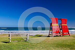 Two red lifesaver stands