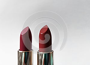 Two red lipsticks