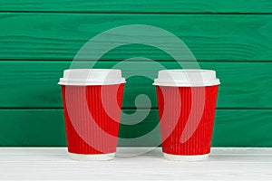 Two red paper cardboard texture coffee Cup