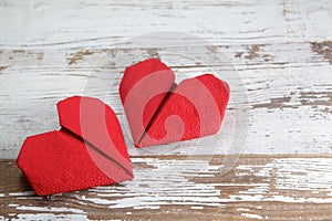 Two red paper hearts