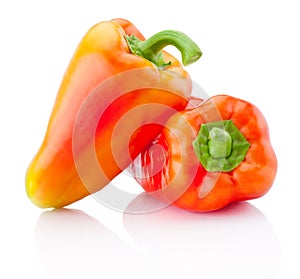 Two red peppers isolated on white background