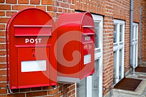 Two red post boxes