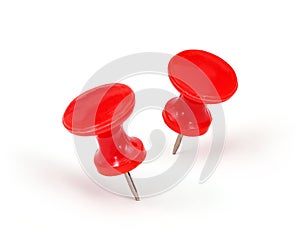 Two red push pins isolated on a white background