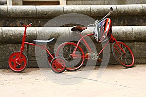 Two red retro bicycles