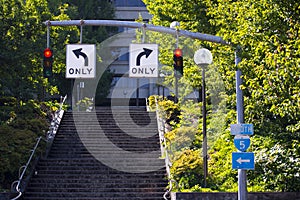 Two red traffic lights and opposite driving directions