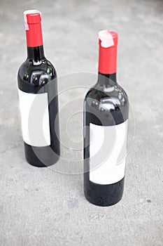 Two red wine bottle