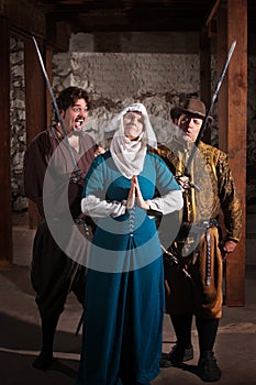 Swordsmen Teasing Nun photo