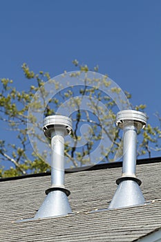 Two Residential Roof Exhaust Vents