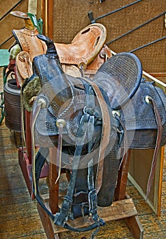 Two Retro Leather Horse Saddles photo