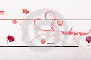 Two ribbon magic hearts on wooden backround, Valentine day concept