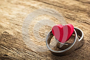 Two ring and heart shape