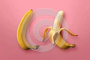Two ripe banana fruits on pink background