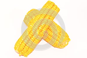 Two ripe ear of corn on a white background