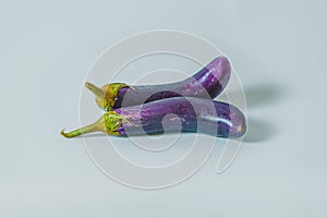 Two Ripe Eggplants on a white background