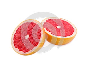 Two Ripe half of pink grapefruit citrus fruit on white background.