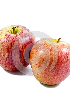 Two ripe red apples