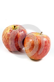 Two ripe red apples