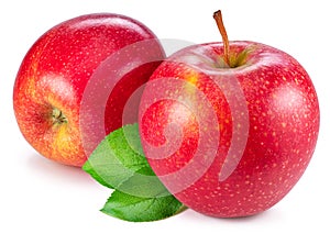 Two ripe red apples with green leaves isolated on white background