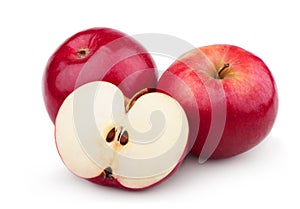 Two ripe red apples and half of apple