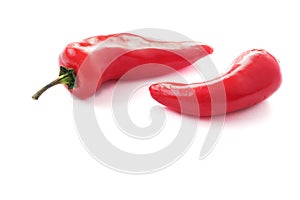 Two ripe red peppers on white background, isolated. Produce product, agriculture industry. Copy space