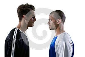 Two rival football player looking at each other