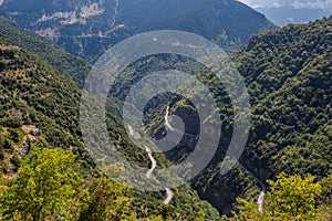 Two roads in the mountain in National Park of Tzoumerka, Greece Epirus region. Mountain in the clouds