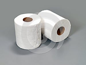 Toilet Paper Rolls Grey Background photo