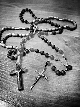 Two rosaries. Artistic look in black and white.