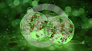 Two Rotating Christmas Green Ice Glass Baubles snow red petals background loop