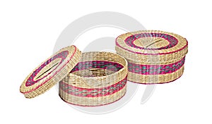 Two round straw boxes