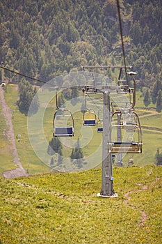 two rows of cable cars one going uphill while one going downhill.