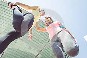 Two runners making stretching