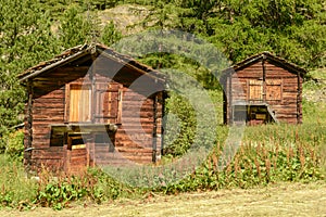 Two rural chalet on the country over Zermatt in the Swiss alps