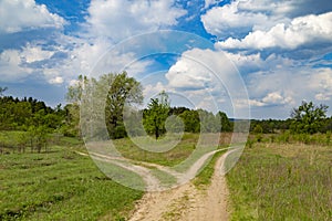 Two rural ground  roads in countryside