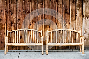 Two Rustic Wooden Log Benches