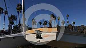 Two sailboat hulls frame a picturesque Santa Barbara Street 4K