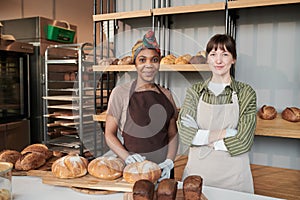 Two saleswomen in bakery shop