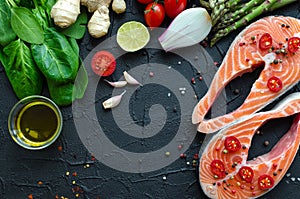 Two salmon steaks with vegetables and spices