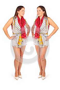 Two same women in studio on white background.