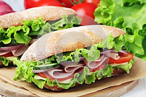 Two sandwiches in ciabatta bread photo
