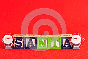 Two santa`s with the word santa