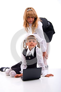 Two Schoolgirls And Laptop.