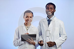 Two Scientific Workers Smiling at Camera