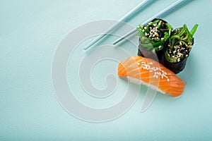 Two seaweed Sushi Chuka and sushi nigiri with salmon