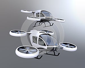 Two self-driving passenger drones flying in the sky