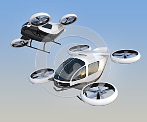 Two self-driving passenger drones flying in the sky photo