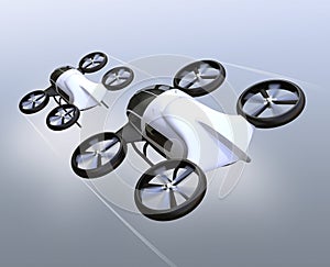 Two self-driving passenger drones flying in the sky