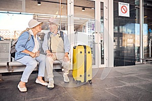 Two senior Caucasian people teasing one another